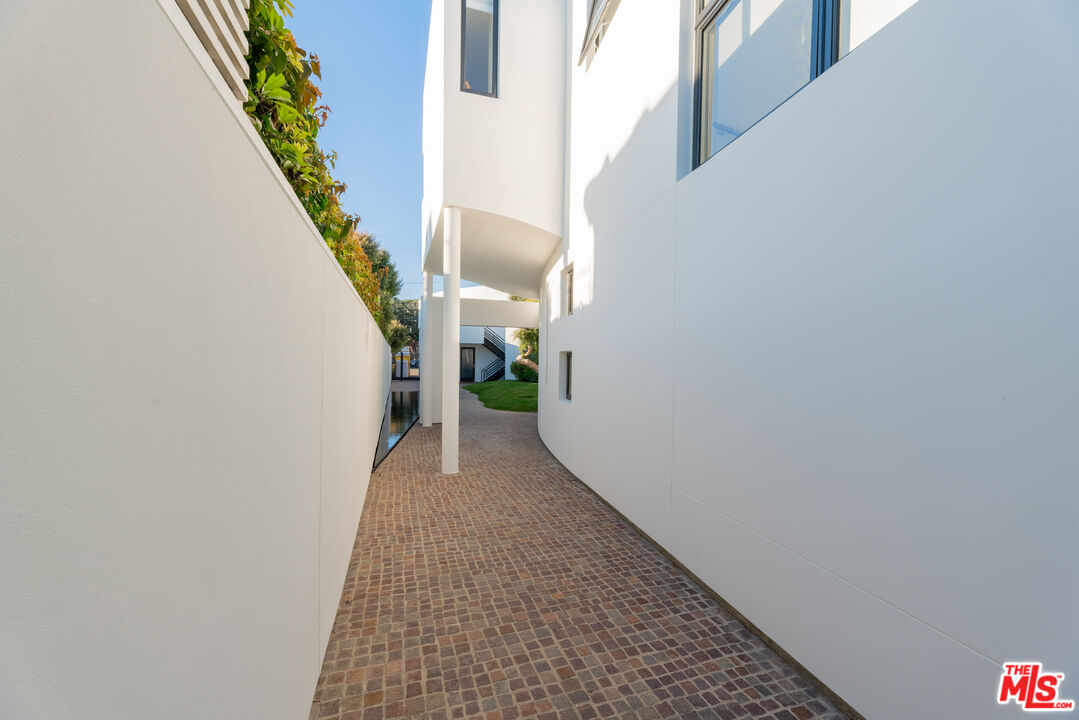 23754 Malibu Road Malibu, CA 90265 - Photo 20 of 59 a view of a hallway with stairs
