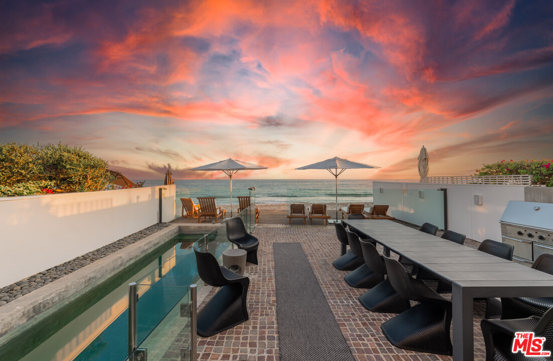 23754 Malibu Road Malibu, CA 90265 - Photo 56 of 59 a view of a balcony with chairs