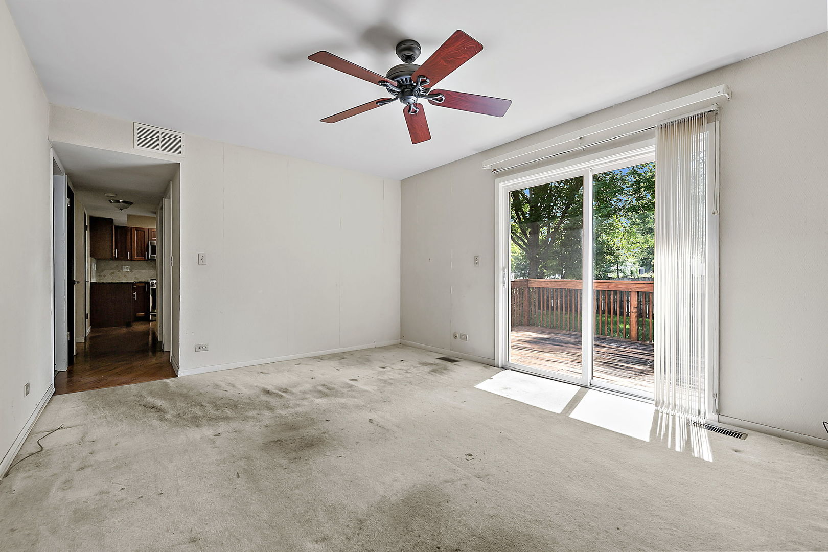 2080 Springside Drive Naperville, IL 60565 - Photo 18 of 31 an empty room with windows and fan
