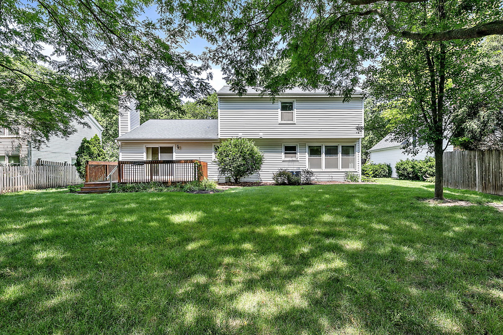 2080 Springside Drive Naperville, IL 60565 - Photo 2 of 31 a front view of a house with a yard