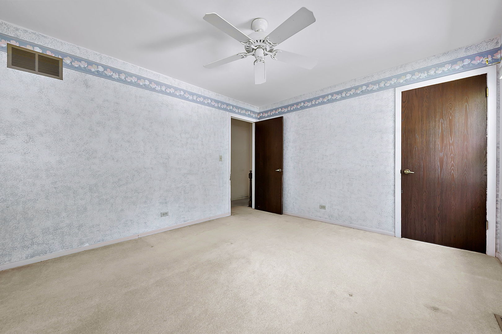 2080 Springside Drive Naperville, IL 60565 - Photo 27 of 31 a view of an empty room with a ceiling fan
