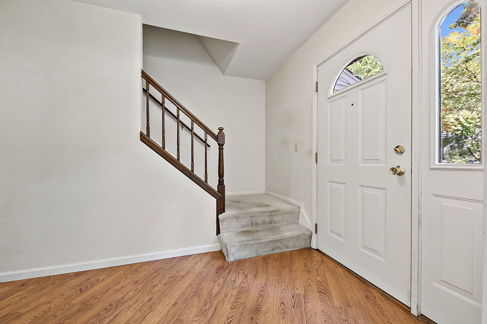 2080 Springside Drive Naperville, IL 60565 - Photo 4 of 31 a view of entryway with wooden floor