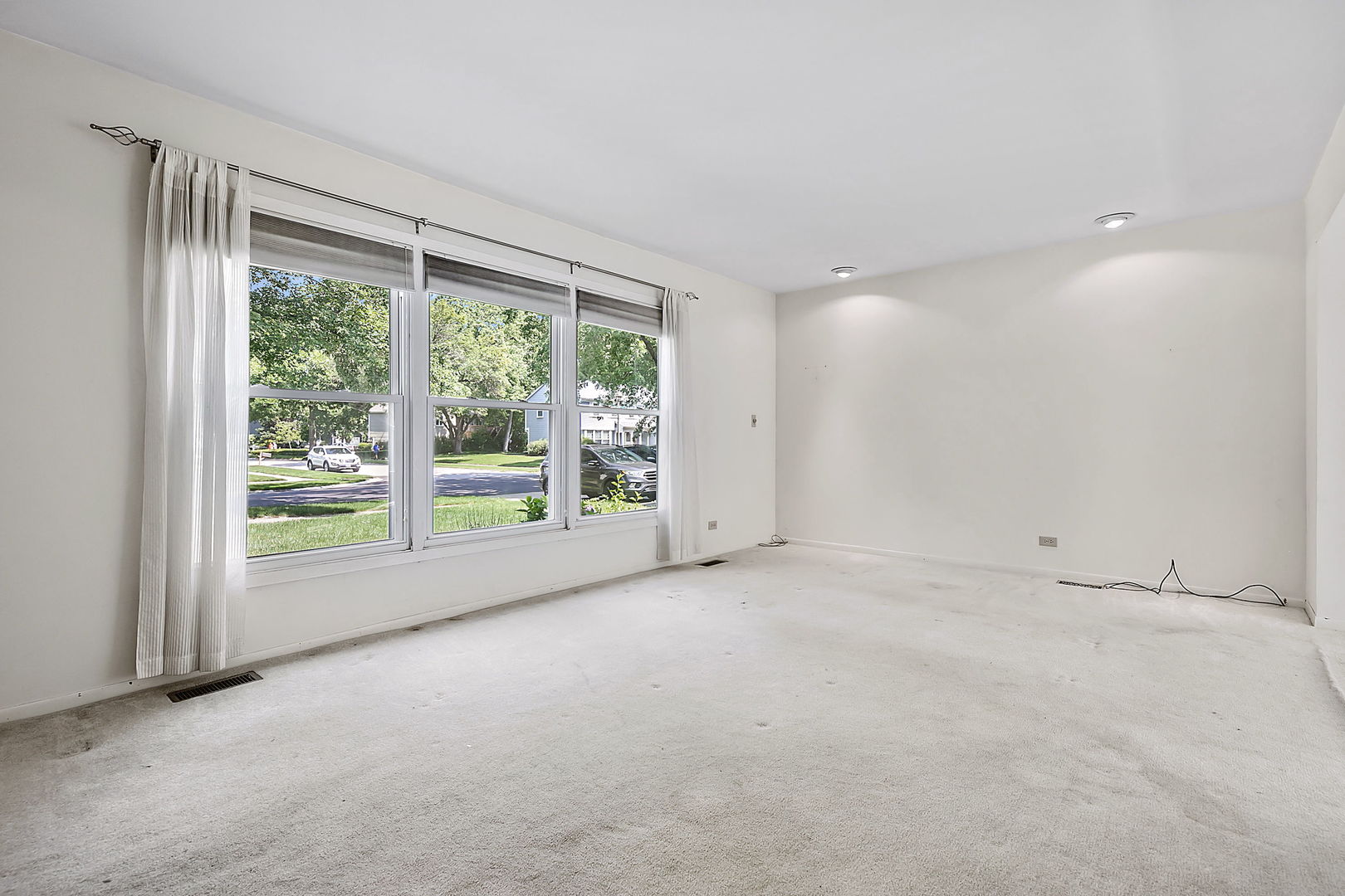 2080 Springside Drive Naperville, IL 60565 - Photo 6 of 31 a view of an empty room with a sliding door