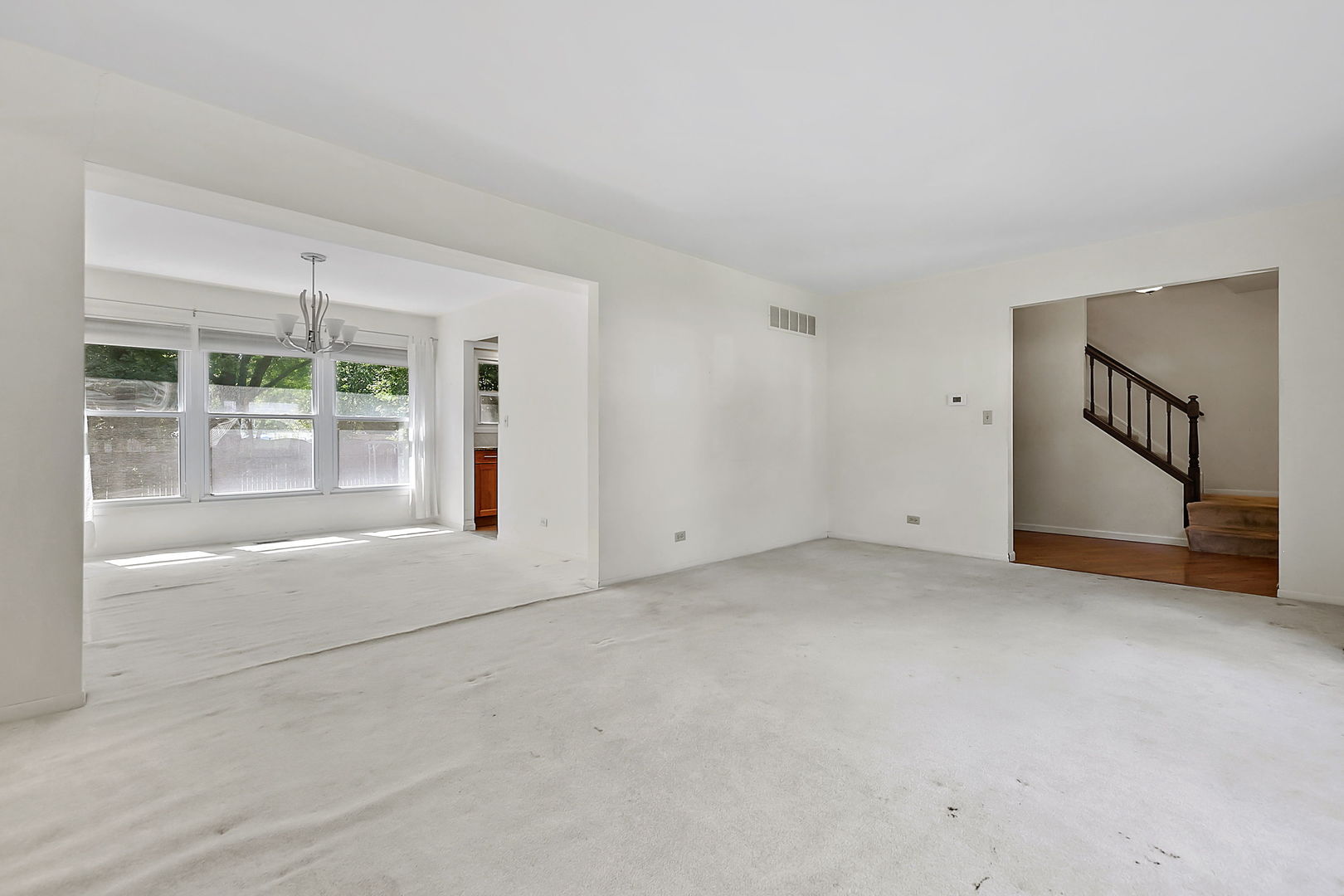 2080 Springside Drive Naperville, IL 60565 - Photo 8 of 31 an empty room with windows