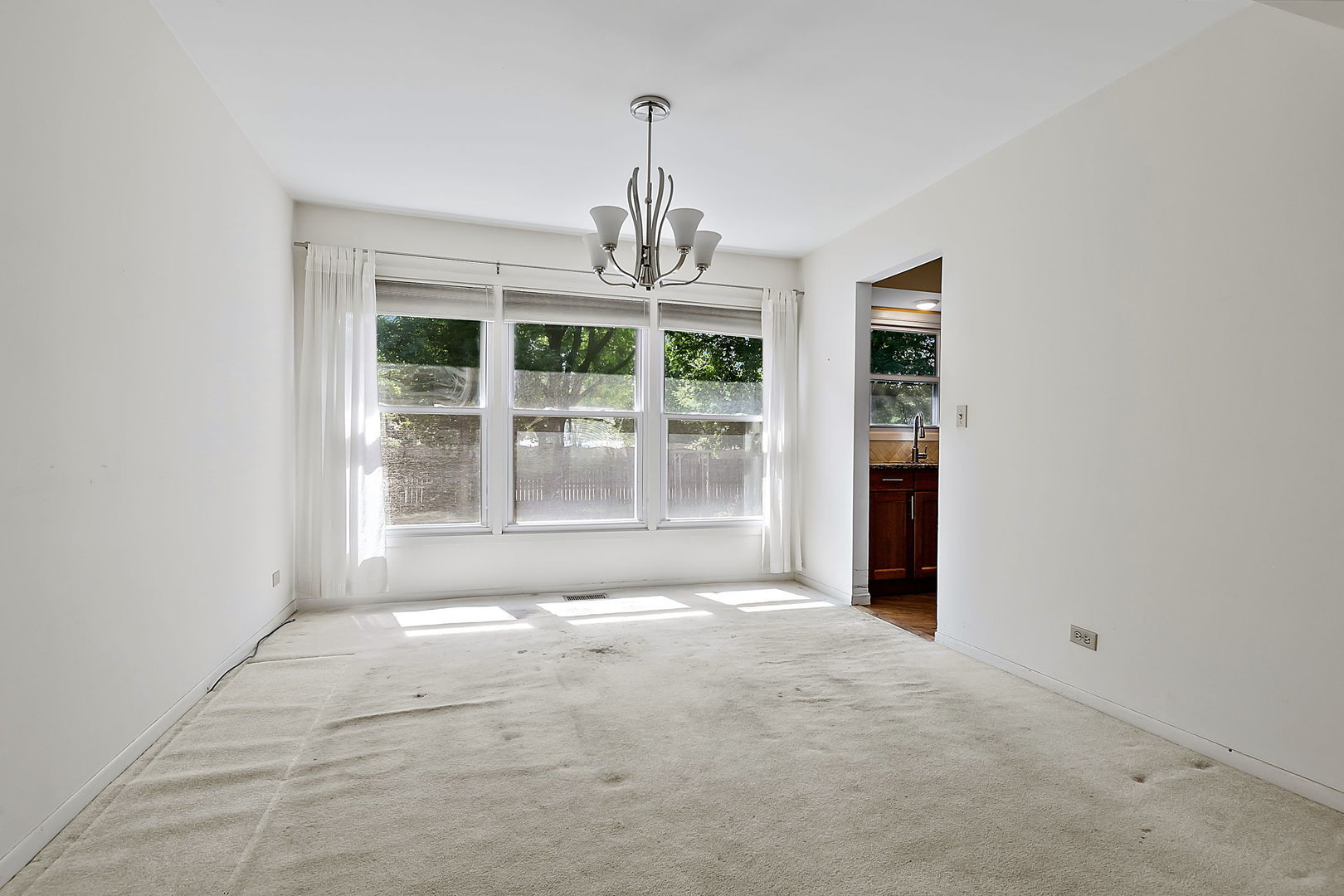 2080 Springside Drive Naperville, IL 60565 - Photo 9 of 31 a view of an empty room with a window
