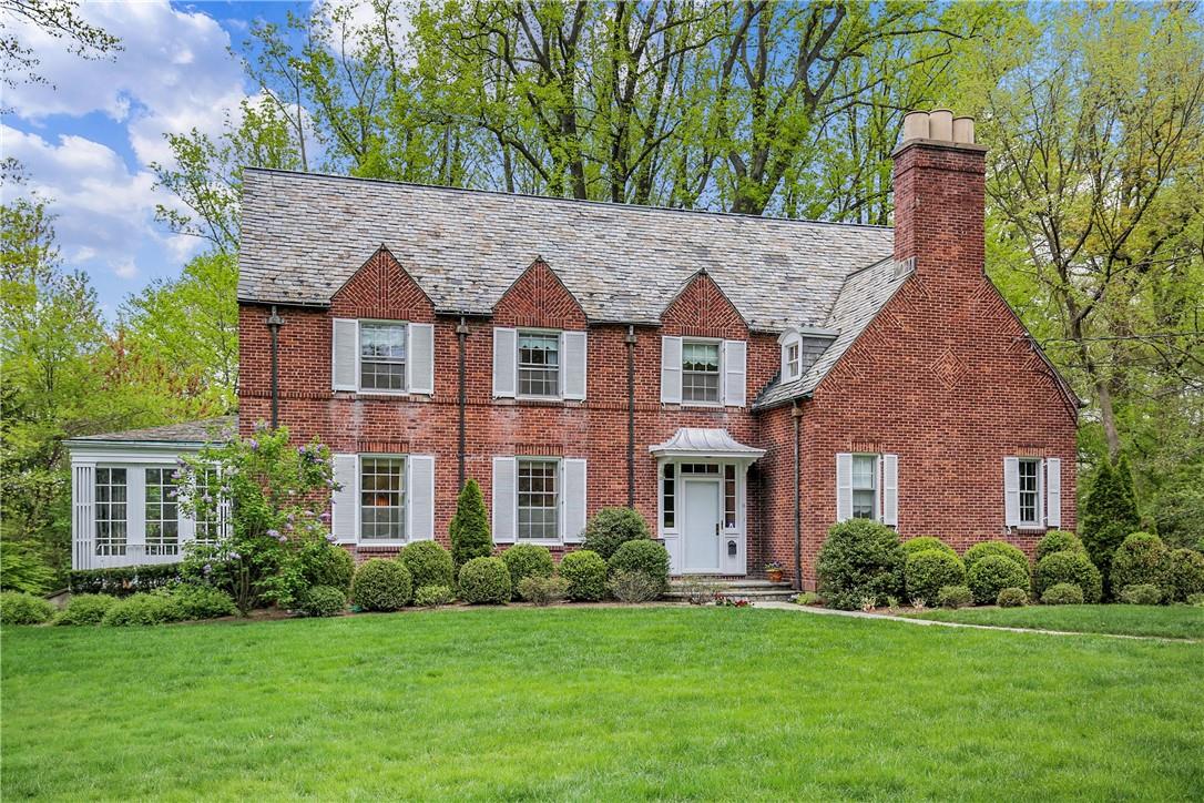 11 Overlook Road Scarsdale, NY 10583 - Photo 1 of 1 front view of a house with a yard