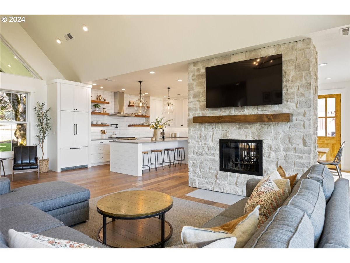 29050 Southwest Petes Mountain Road West Linn, OR 97068 - Photo 13 of 48 a living room with furniture and a flat screen tv