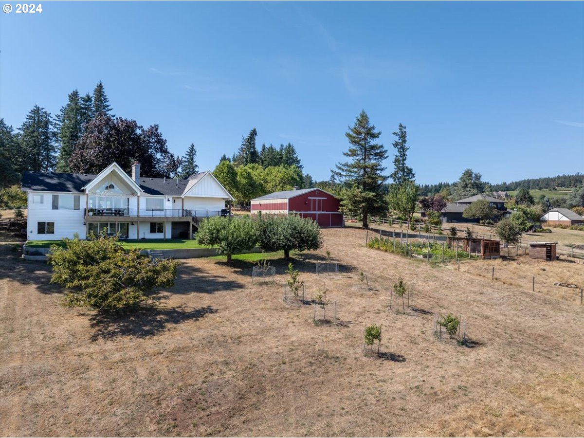 29050 Southwest Petes Mountain Road West Linn, OR 97068 - Photo 39 of 48 a front view of a house with a yard