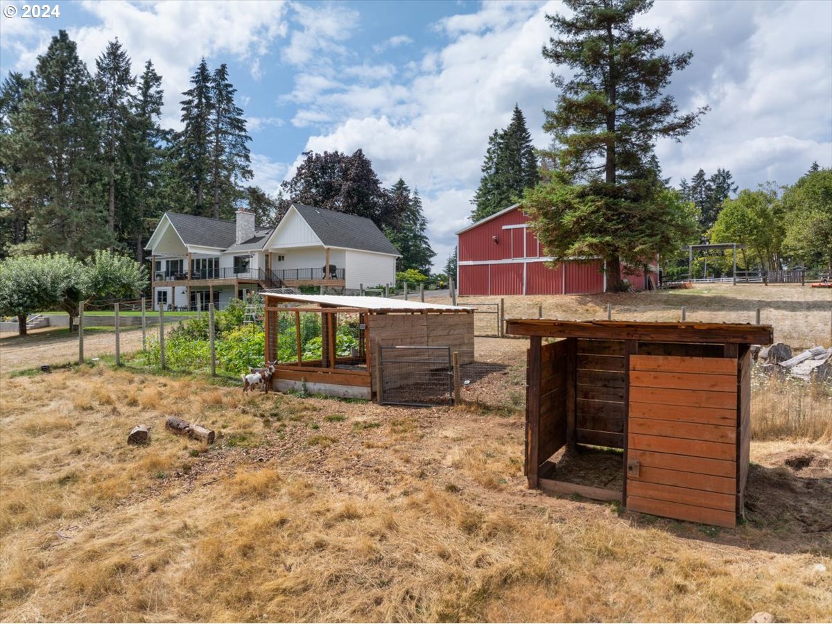 29050 Southwest Petes Mountain Road West Linn, OR 97068 - Photo 44 of 48 a view of a house with a yard and sitting area