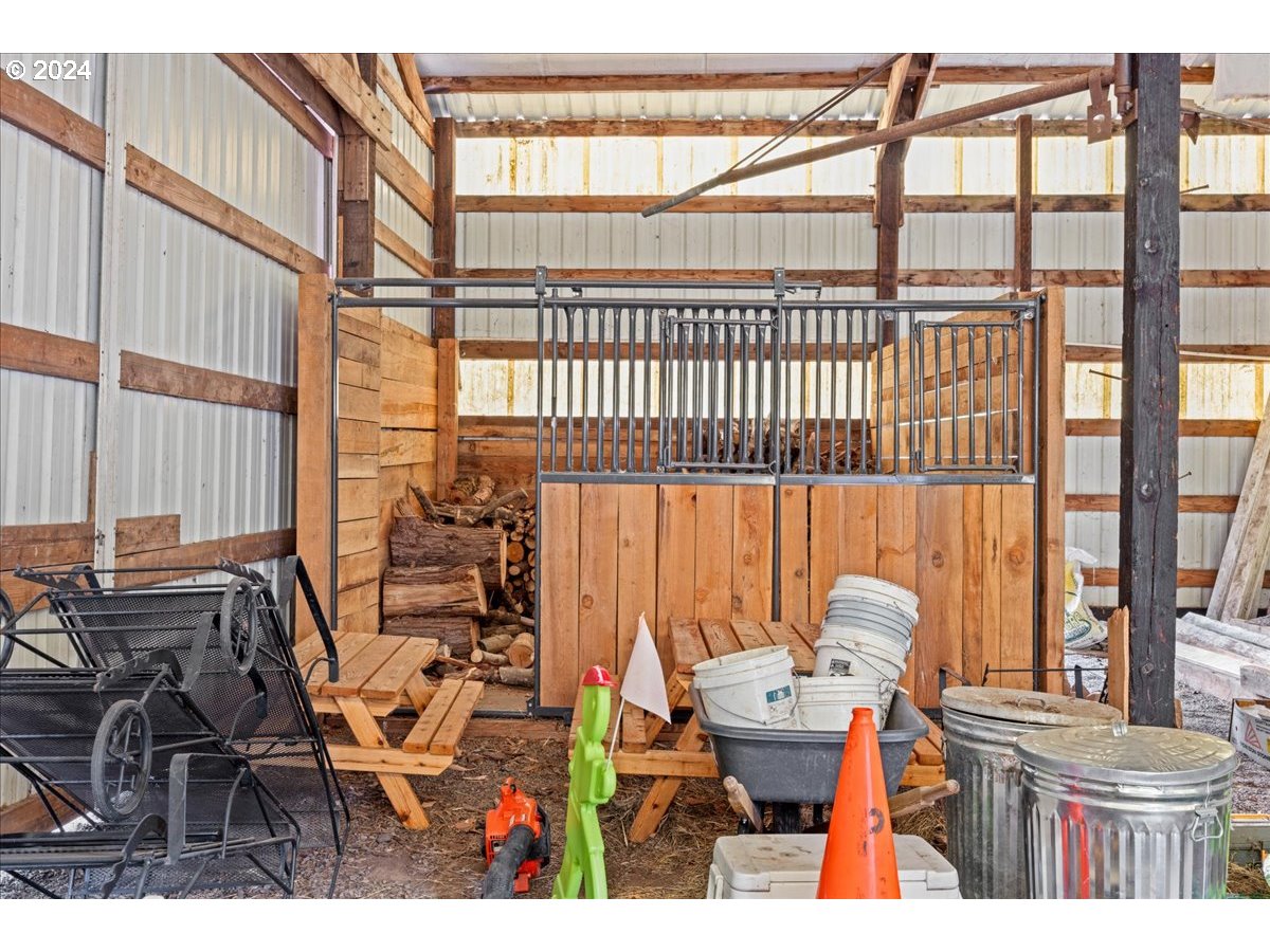 29050 Southwest Petes Mountain Road West Linn, OR 97068 - Photo 46 of 48 a balcony with table and chairs