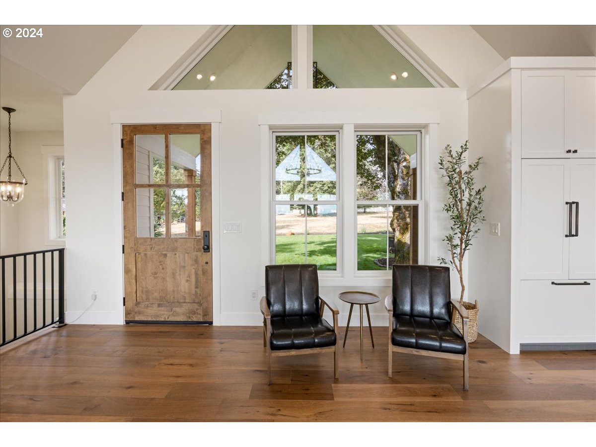 29050 Southwest Petes Mountain Road West Linn, OR 97068 - Photo 6 of 48 a living room with furniture window and wooden floor