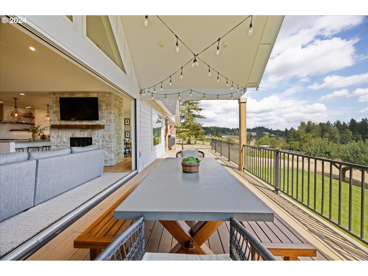 29050 Southwest Petes Mountain Road West Linn, OR 97068 - Photo 10 of 48 a view of a patio with a table and chairs