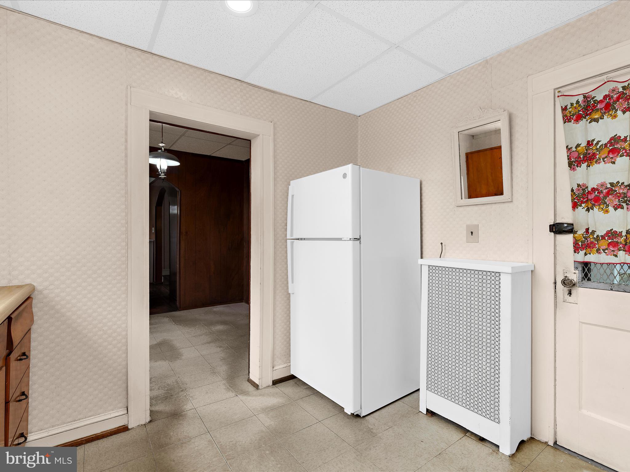 5000 Levindale Road Baltimore, MD 21215 - Photo 19 of 60 a view of hallway with cabinets and refrigerator
