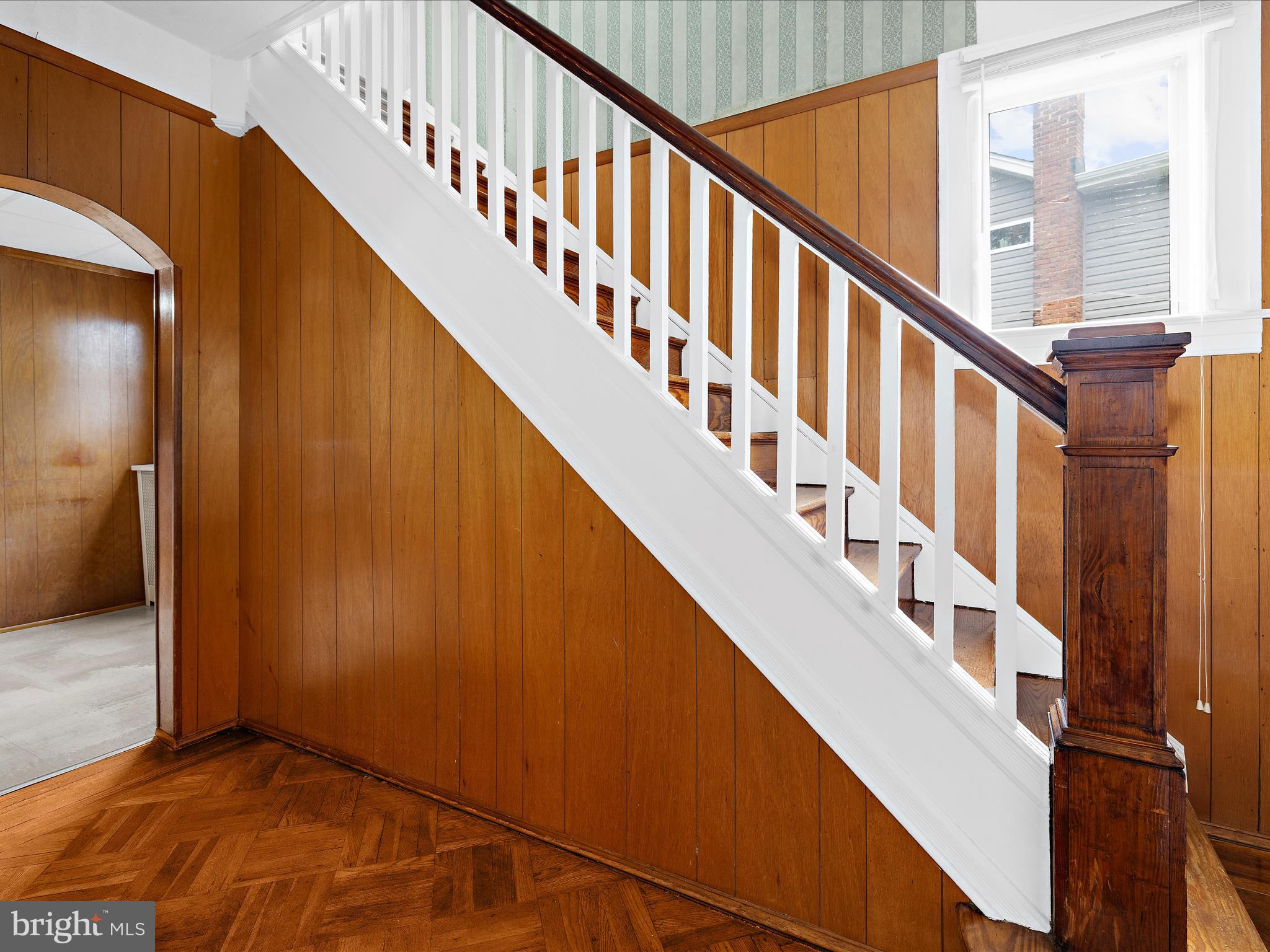 5000 Levindale Road Baltimore, MD 21215 - Photo 20 of 60 a view of staircase with wooden floor and white walls