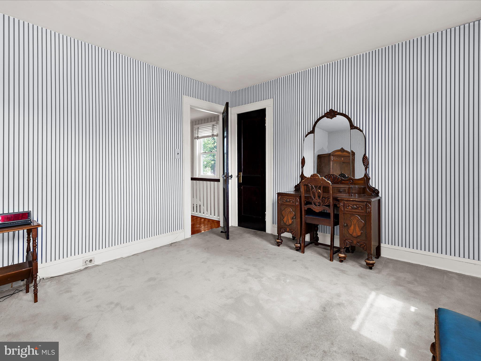 5000 Levindale Road Baltimore, MD 21215 - Photo 25 of 60 a view of a room with furniture and a ceiling fan