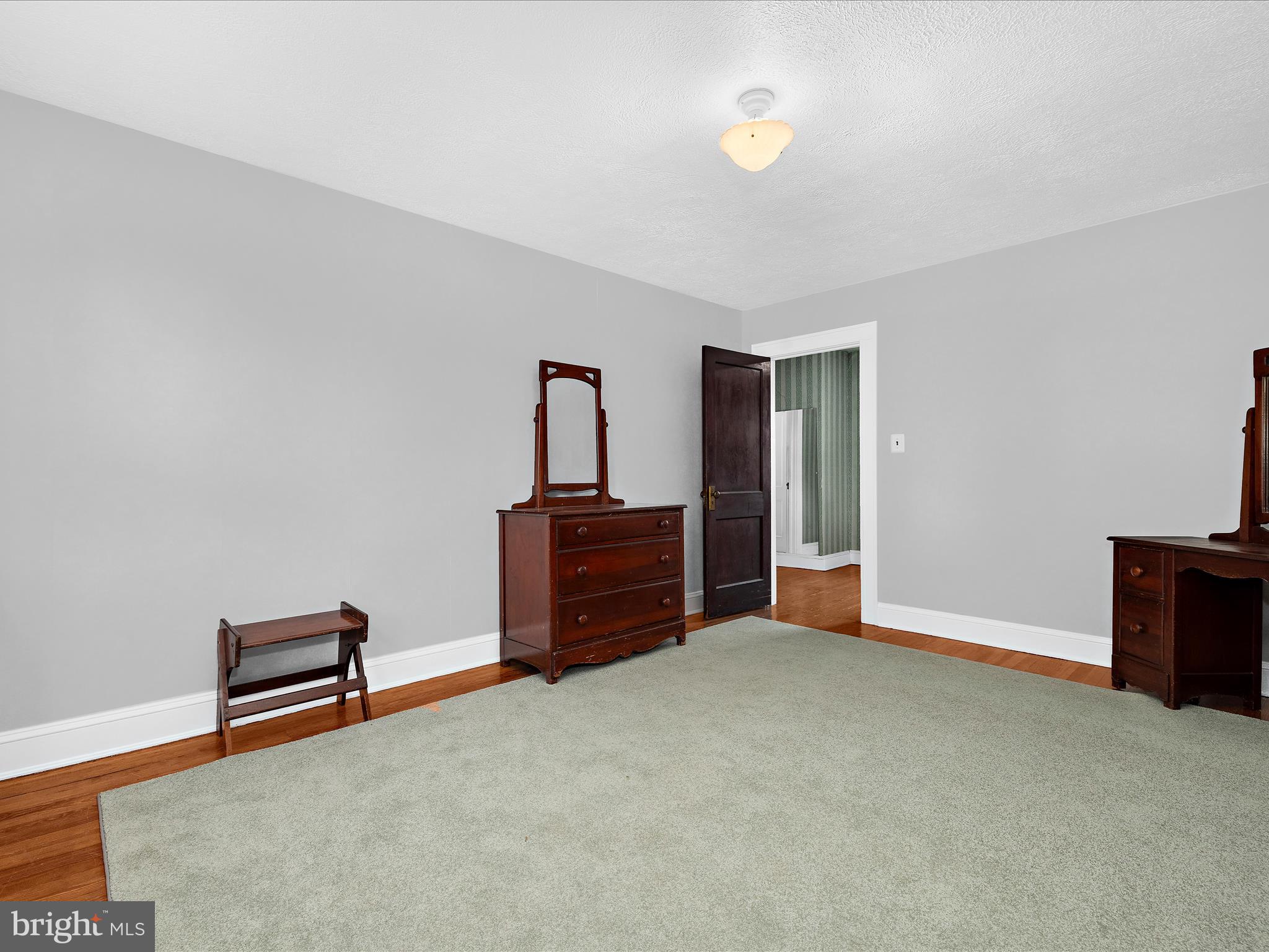 5000 Levindale Road Baltimore, MD 21215 - Photo 27 of 60 a room with furniture and a chandelier