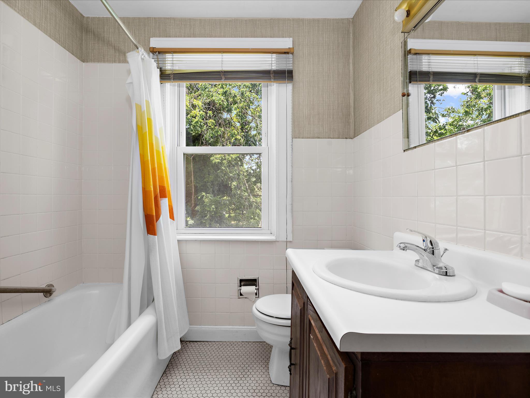 5000 Levindale Road Baltimore, MD 21215 - Photo 30 of 60 a bathroom with a sink toilet and tub