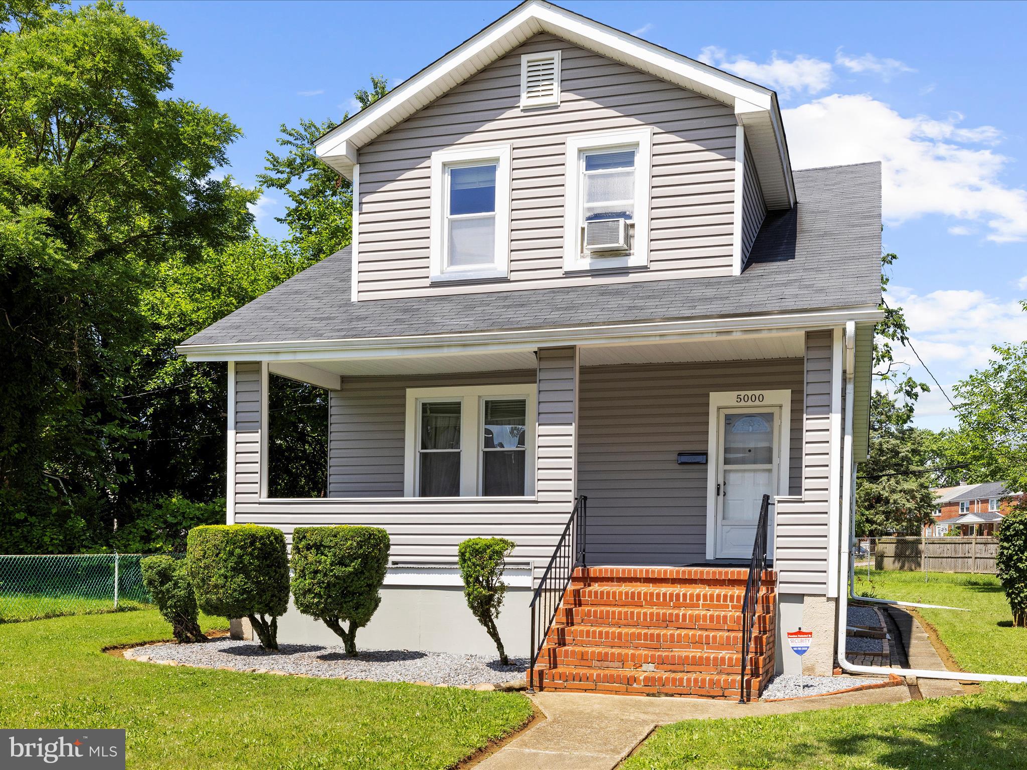 5000 Levindale Road Baltimore, MD 21215 - Photo 3 of 60 a front view of a house with garden