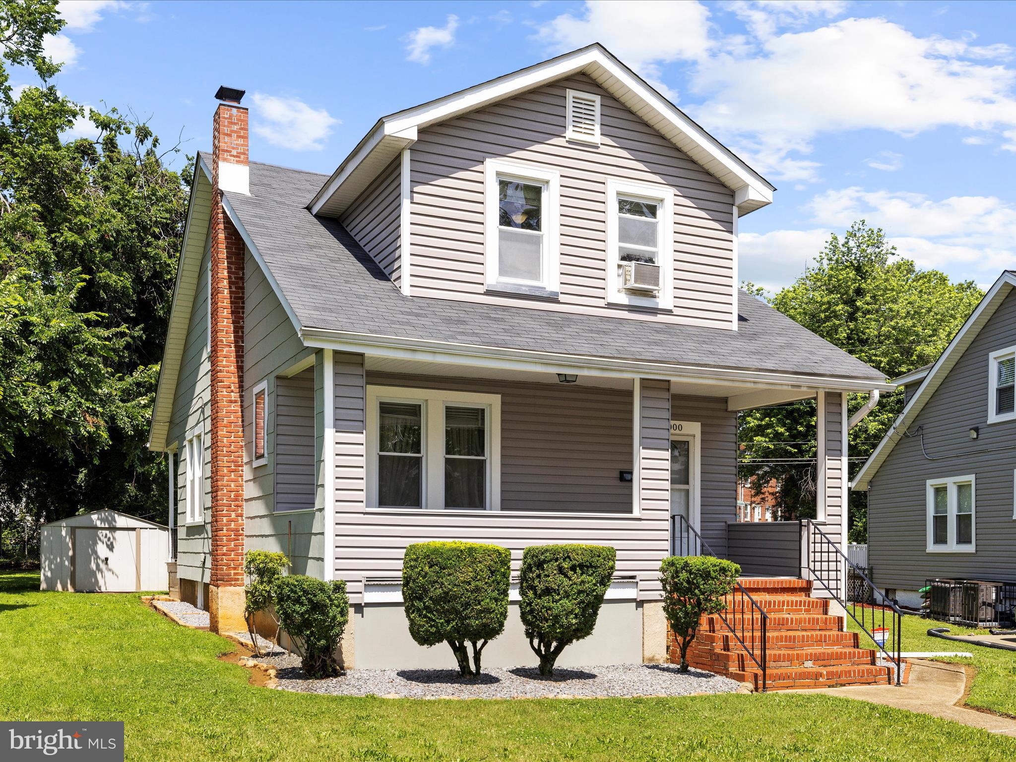 5000 Levindale Road Baltimore, MD 21215 - Photo 4 of 60 a front view of a house with a yard