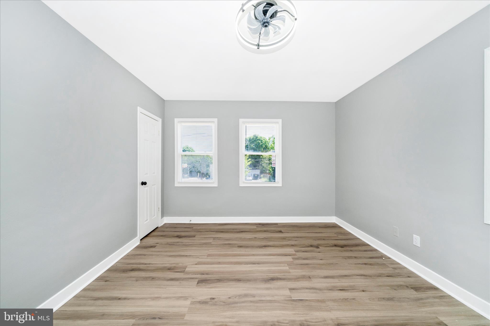 5027 Benning Road Southeast Washington, DC 20019 - Photo 34 of 57 wooden floor in a room next to a window