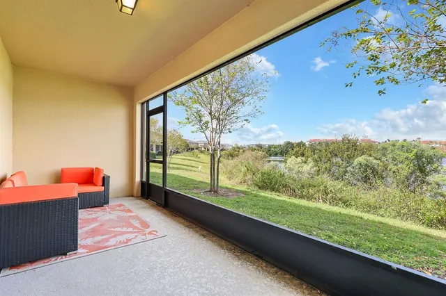 a view of a room with a large window