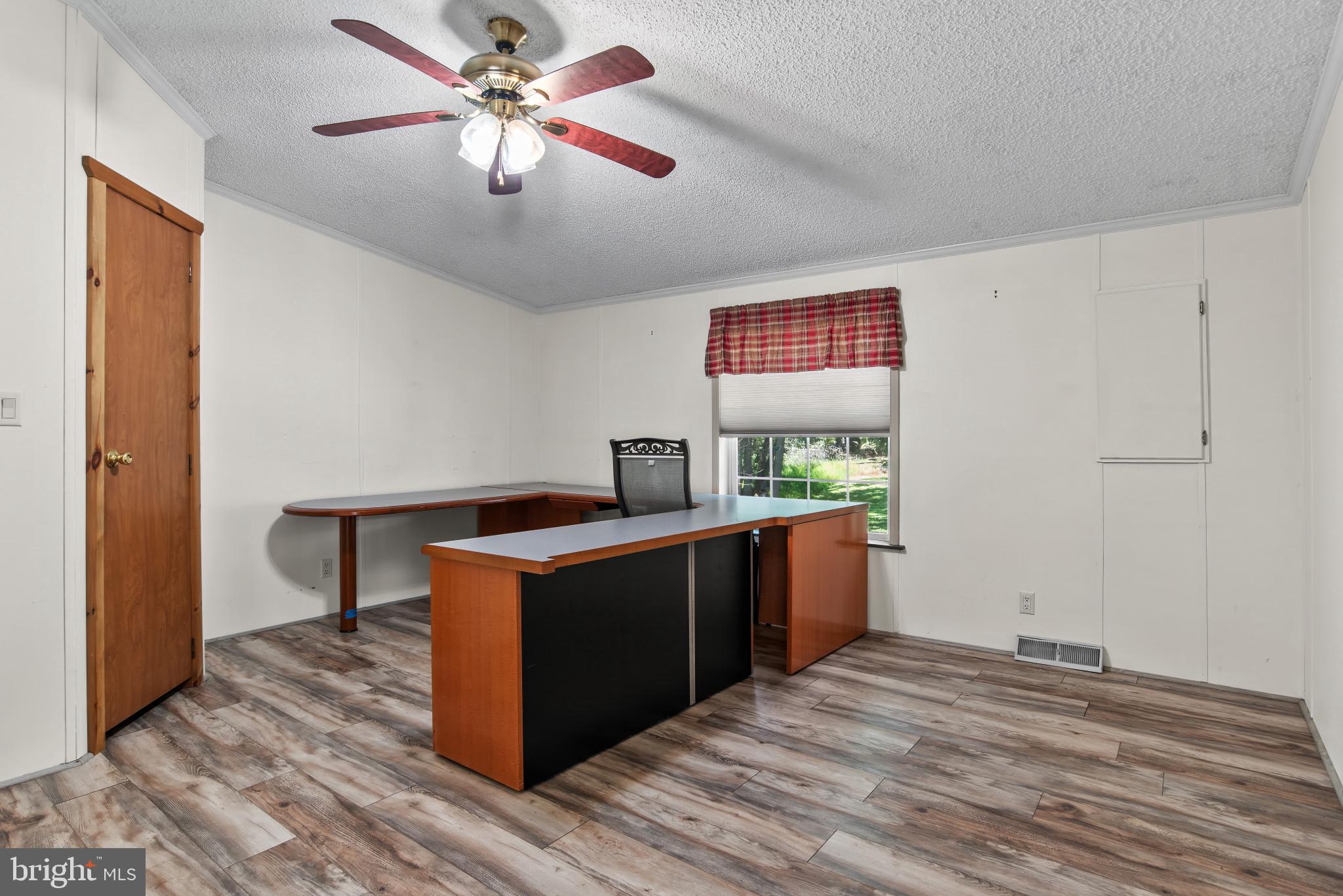 49 Clapsaddle Road Gettysburg, PA 17325 - Photo 23 of 36 a kitchen with stainless steel appliances granite countertop a stove and a sink