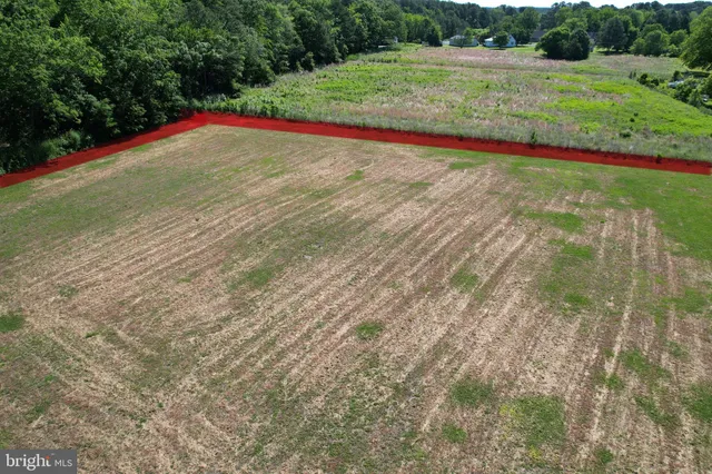 a view of a backyard of a house