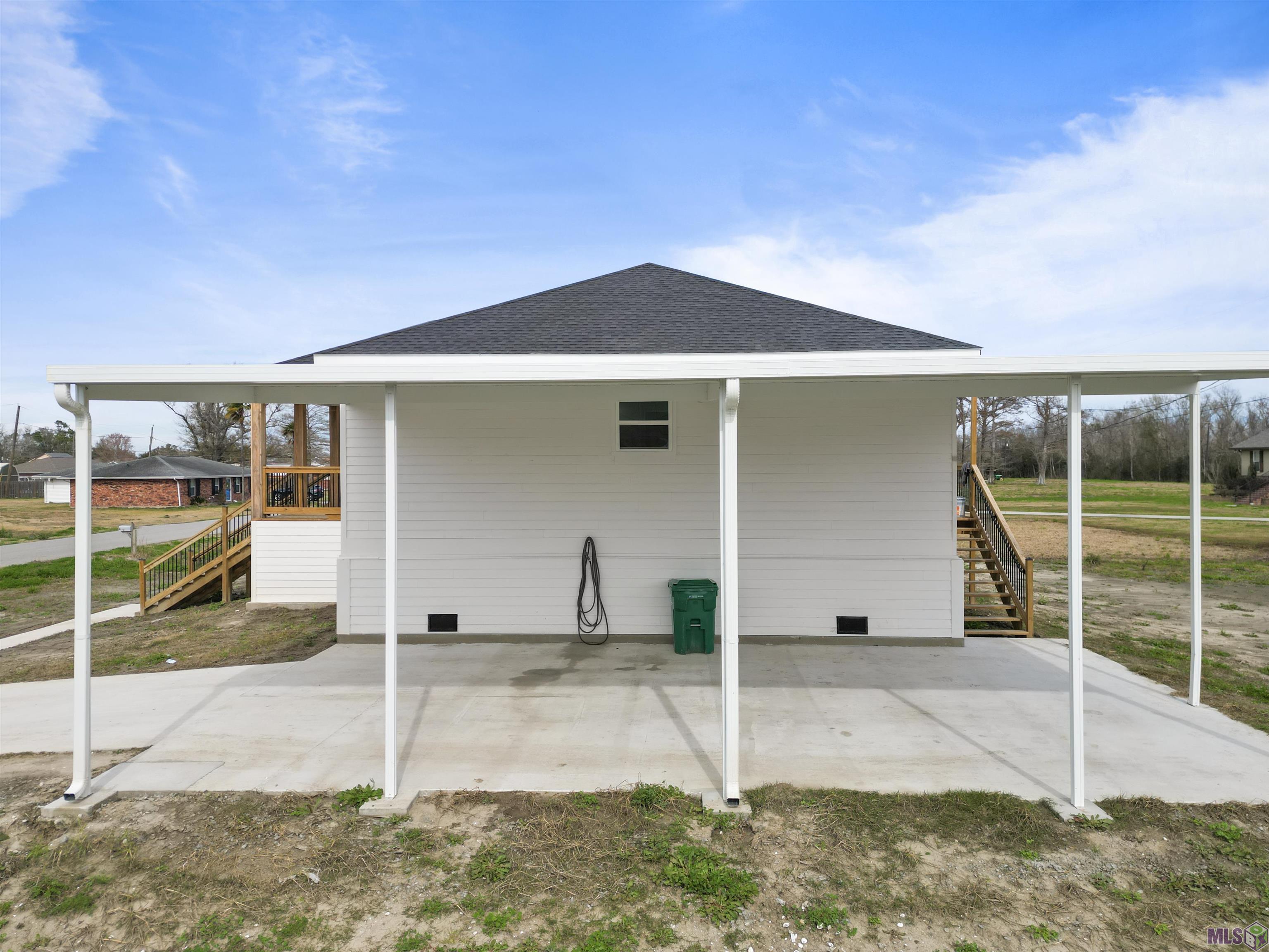 525 Cypress Street Raceland, LA 70394 - Photo 4 of 14 carport