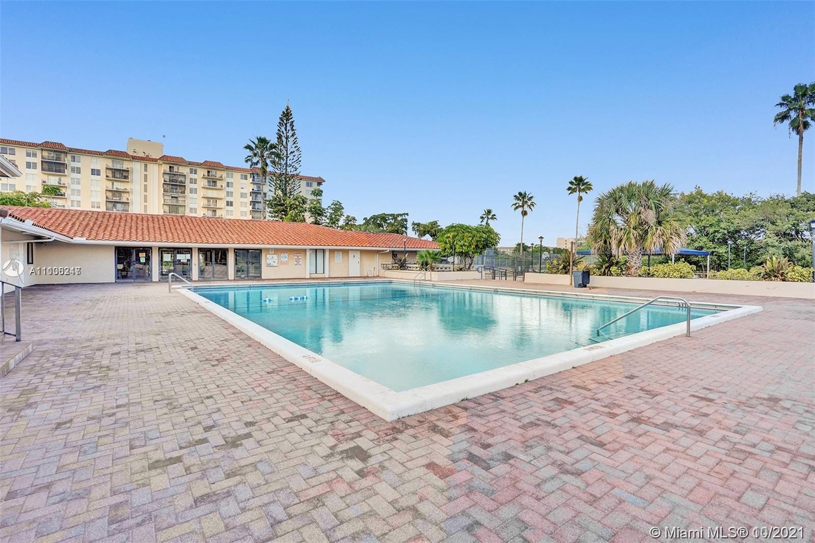 4172 Inverrary Drive, Unit 304 Lauderhill, FL 33319 - Photo 12 of 13 a view of a lake with a houses