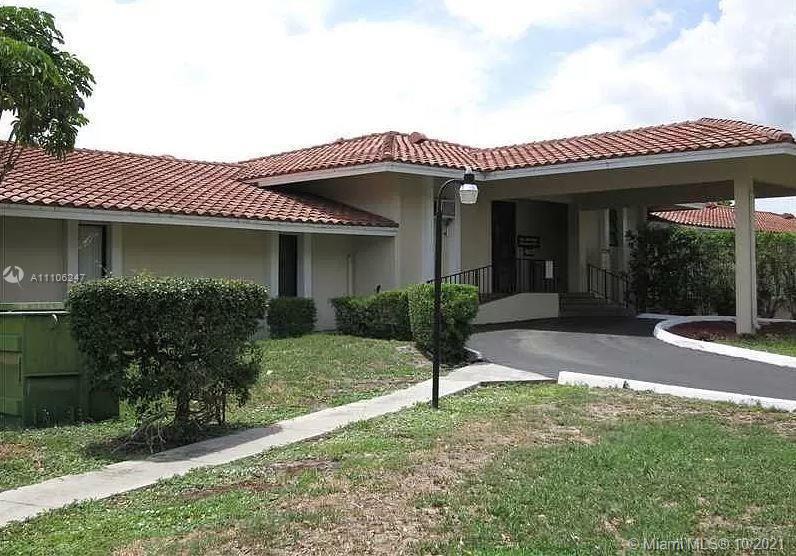 4172 Inverrary Drive, Unit 304 Lauderhill, FL 33319 - Photo 13 of 13 a view of a house with backyard porch and sitting area