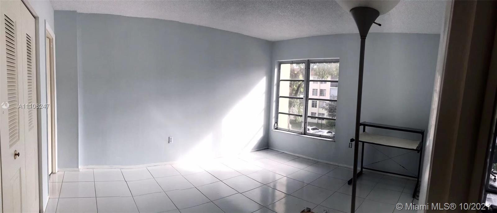 4172 Inverrary Drive, Unit 304 Lauderhill, FL 33319 - Photo 3 of 13 a view of an empty room with a window