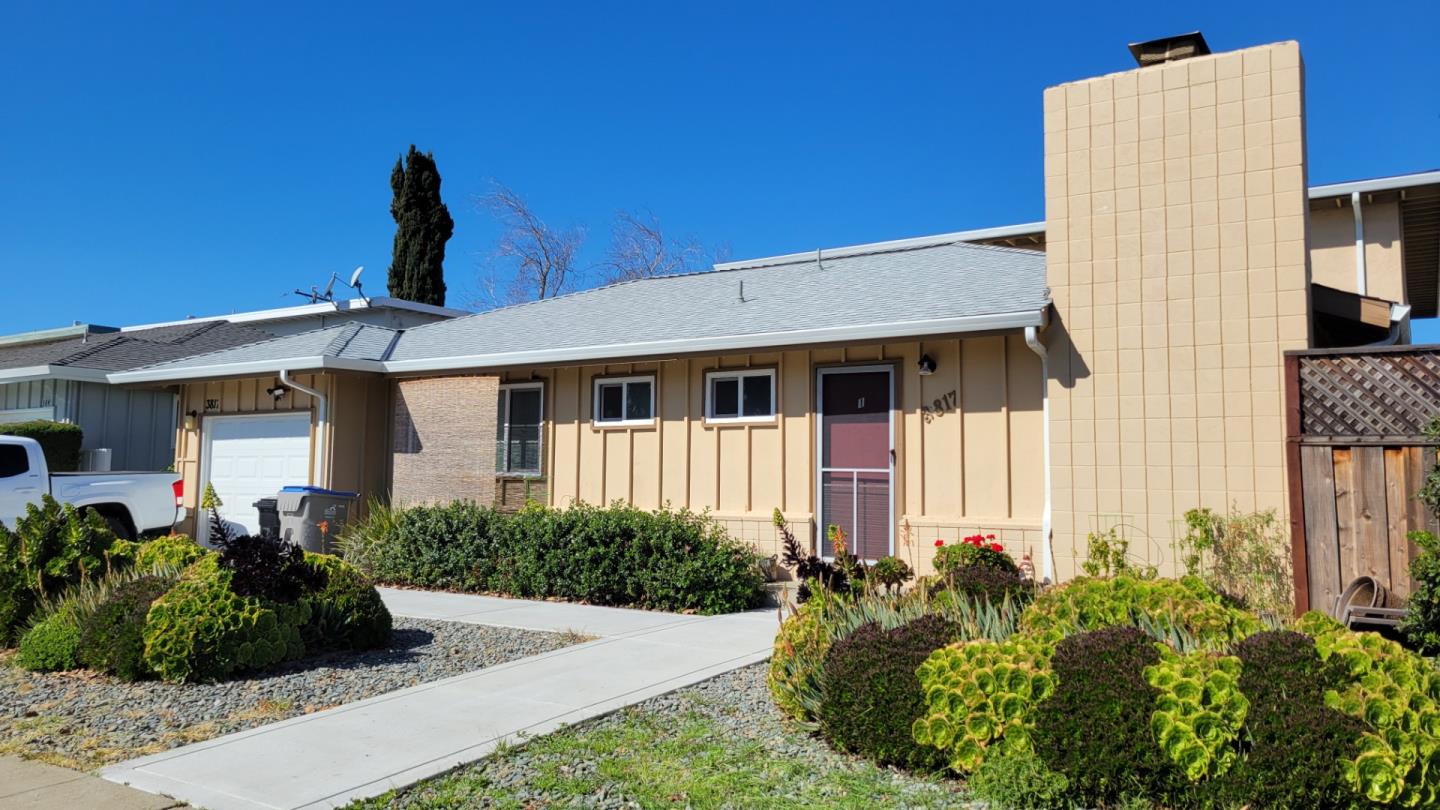 3817 Starview Drive San Jose, CA 95124 - Photo 2 of 15 a front view of a house with garden