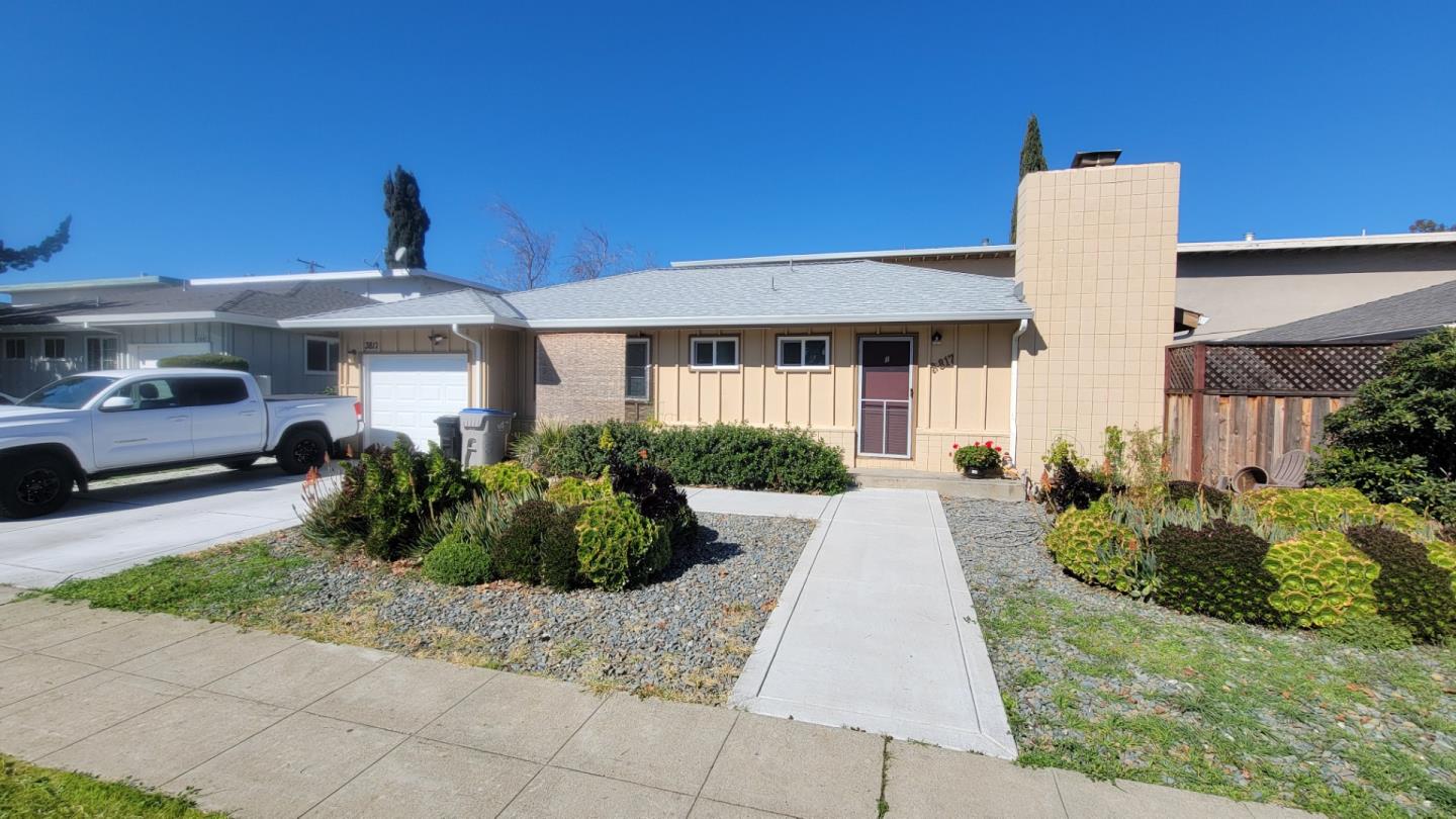 3817 Starview Drive San Jose, CA 95124 - Photo 3 of 15 a front view of a house with garden