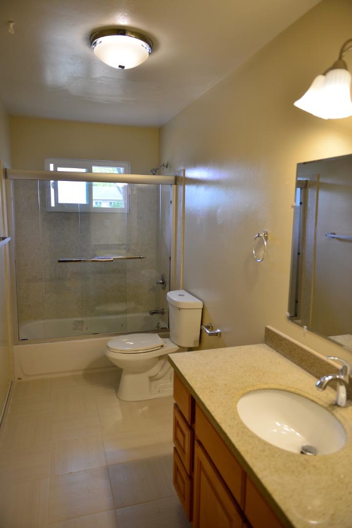 3817 Starview Drive San Jose, CA 95124 - Photo 10 of 15 a bathroom with a sink toilet and shower