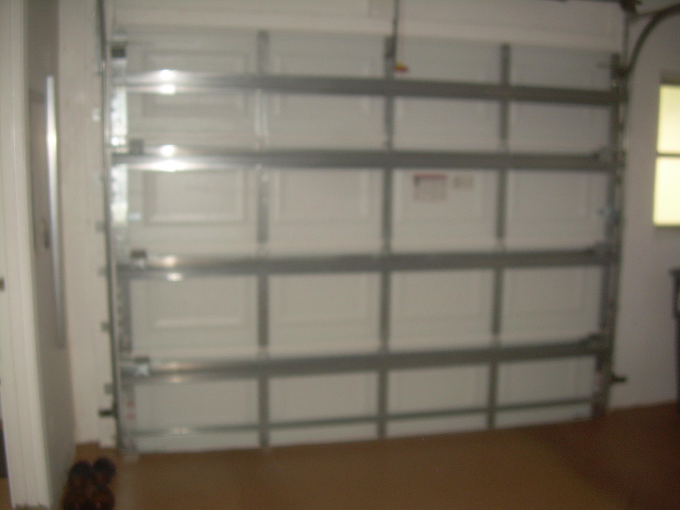 8700 Jasmine Way, Unit B Boca Raton, FL 33496 - Photo 29 of 32 a view of a room with racks on the wall