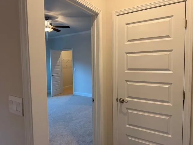 a bathroom with a glass door shower
