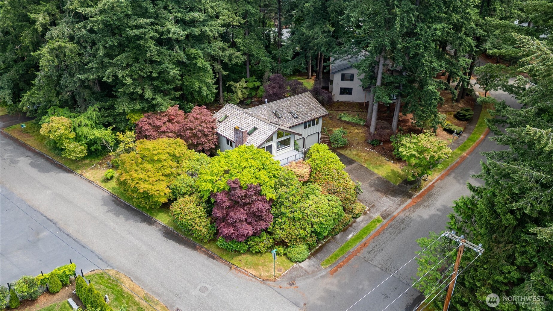 601 Clark Road Bellingham, WA 98225 - Photo 33 of 38 an aerial view of a house with a yard and garden