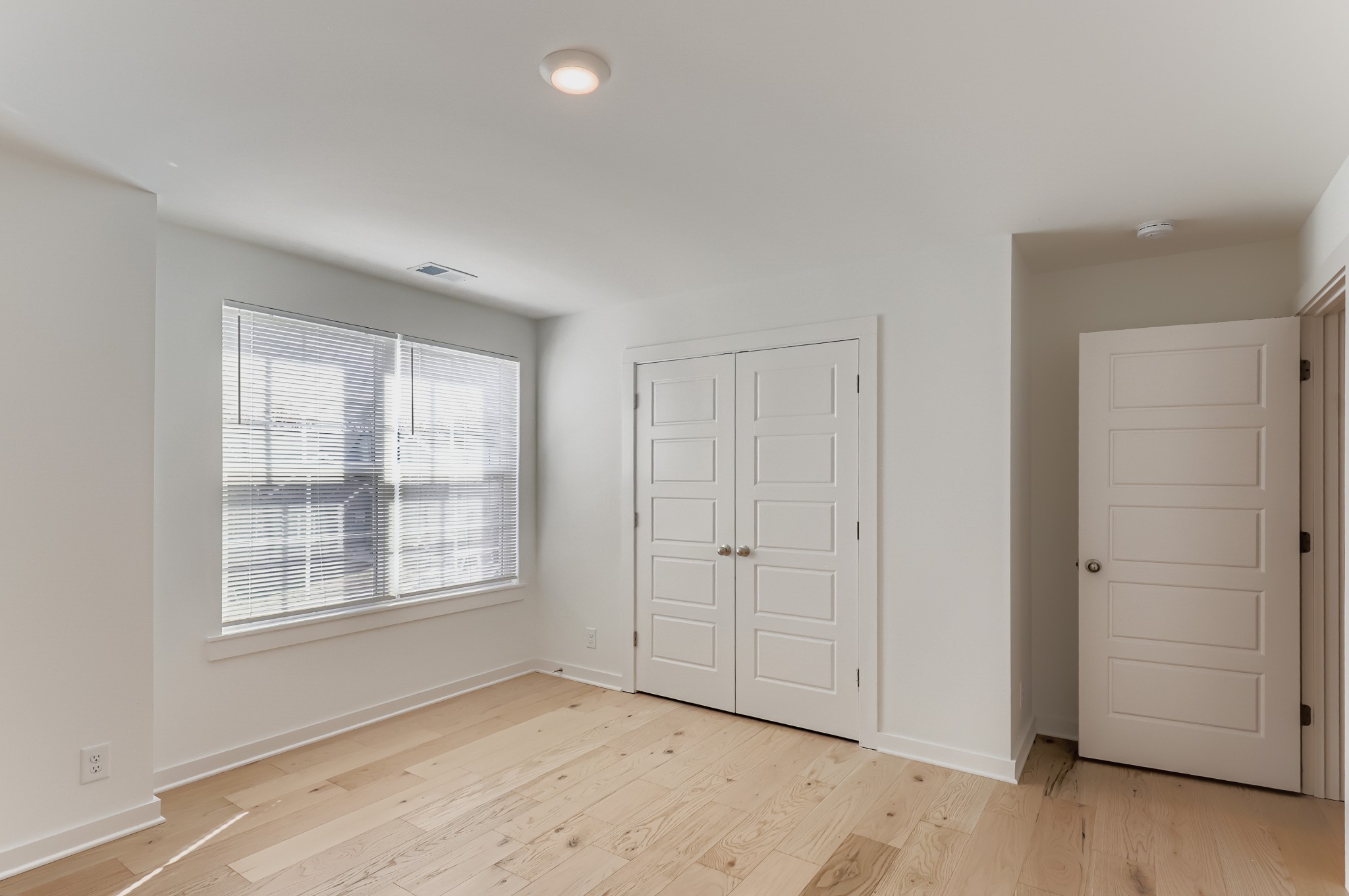 1121 Alcove Way Antioch, TN 37013 - Photo 17 of 25 an empty room with windows and closet