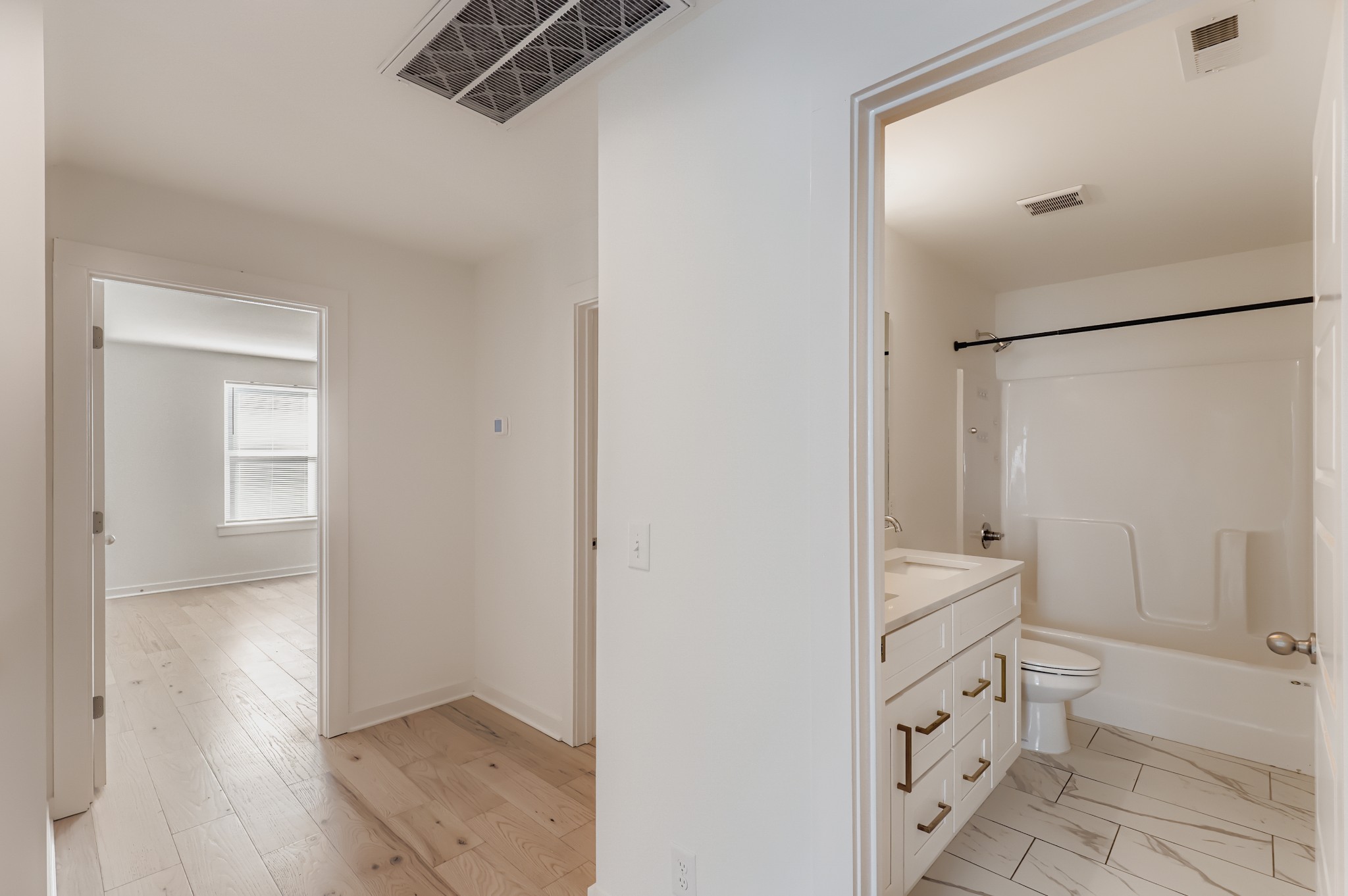 1121 Alcove Way Antioch, TN 37013 - Photo 19 of 25 a bathroom with a shower and a sink