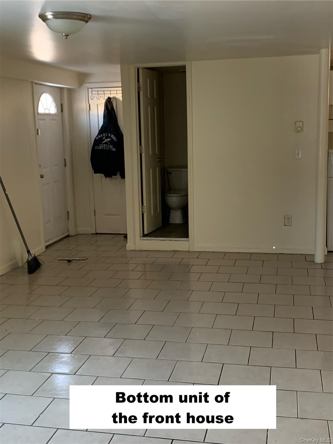 105-107 East Cold Spring Road Monticello, NY 12701 - Photo 4 of 22 Entryway featuring baseboards and light tile patterned flooring