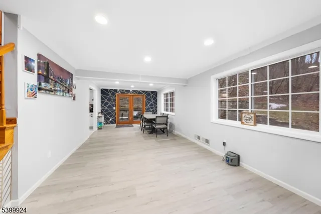 a view of livingroom with furniture and window