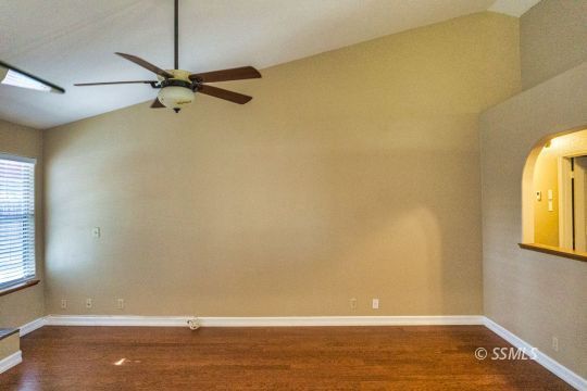 512 Amanda Street Ridgecrest, CA 93555 - Photo 18 of 44 a view of a room with window and a ceiling fan