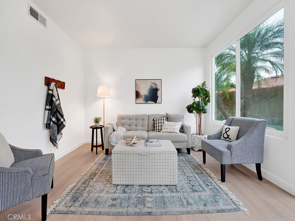13814 Apache Tustin, CA 92782 - Photo 13 of 45 a living room with furniture and a large window