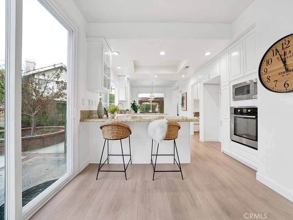 13814 Apache Tustin, CA 92782 - Photo 14 of 45 a living room with furniture and a large window