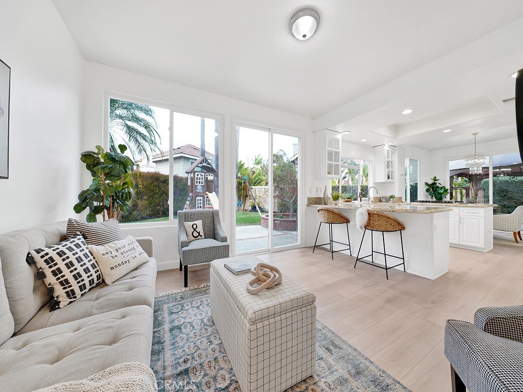 13814 Apache Tustin, CA 92782 - Photo 16 of 45 a living room with furniture and a large window