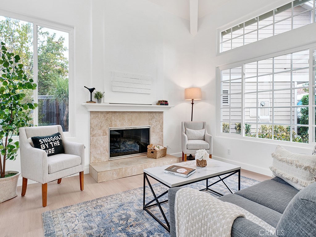 13814 Apache Tustin, CA 92782 - Photo 2 of 45 a living room with furniture and a fireplace