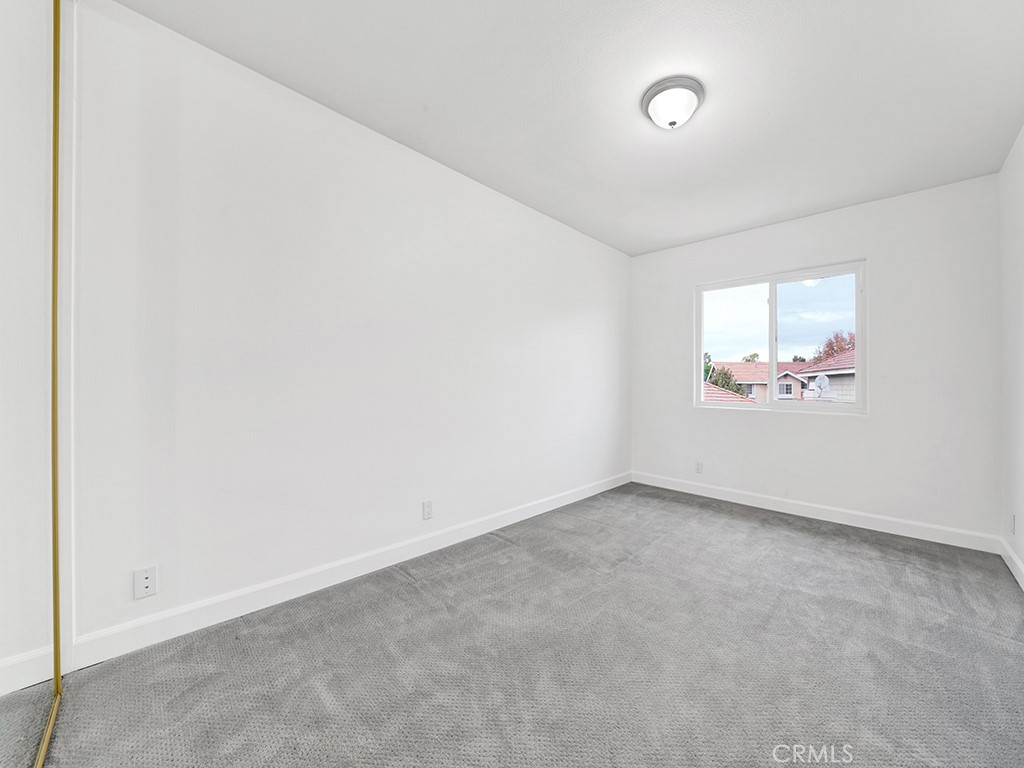 13814 Apache Tustin, CA 92782 - Photo 27 of 45 an empty room with windows