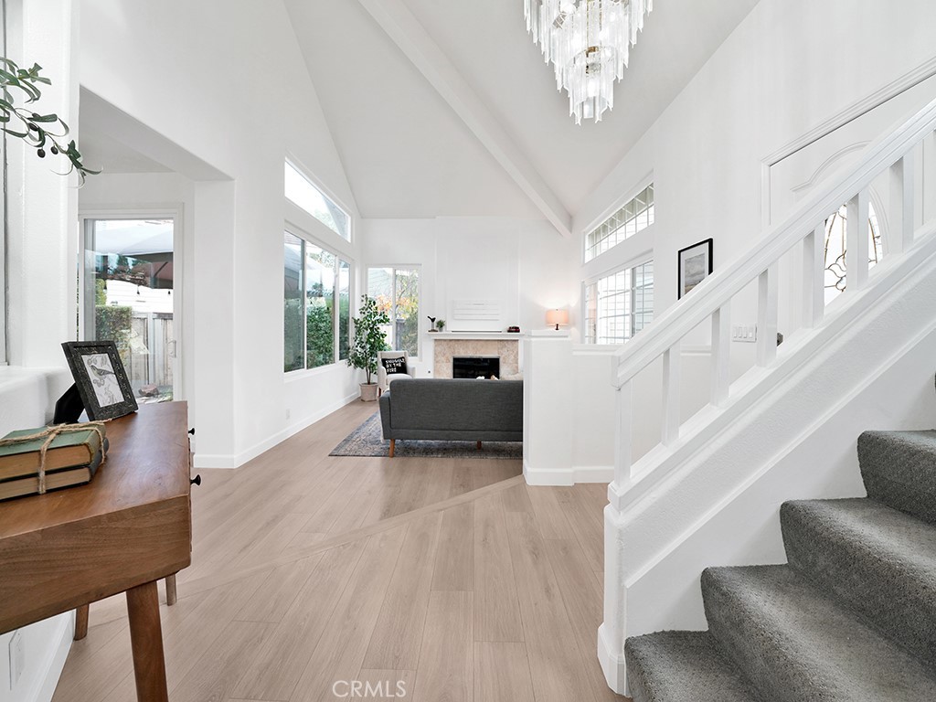 13814 Apache Tustin, CA 92782 - Photo 29 of 45 a living room with furniture and a chandelier