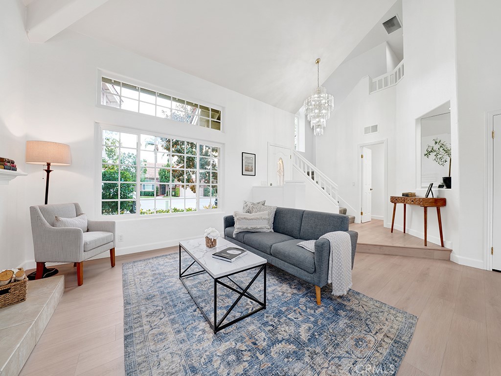 13814 Apache Tustin, CA 92782 - Photo 4 of 45 a living room with furniture and a large window