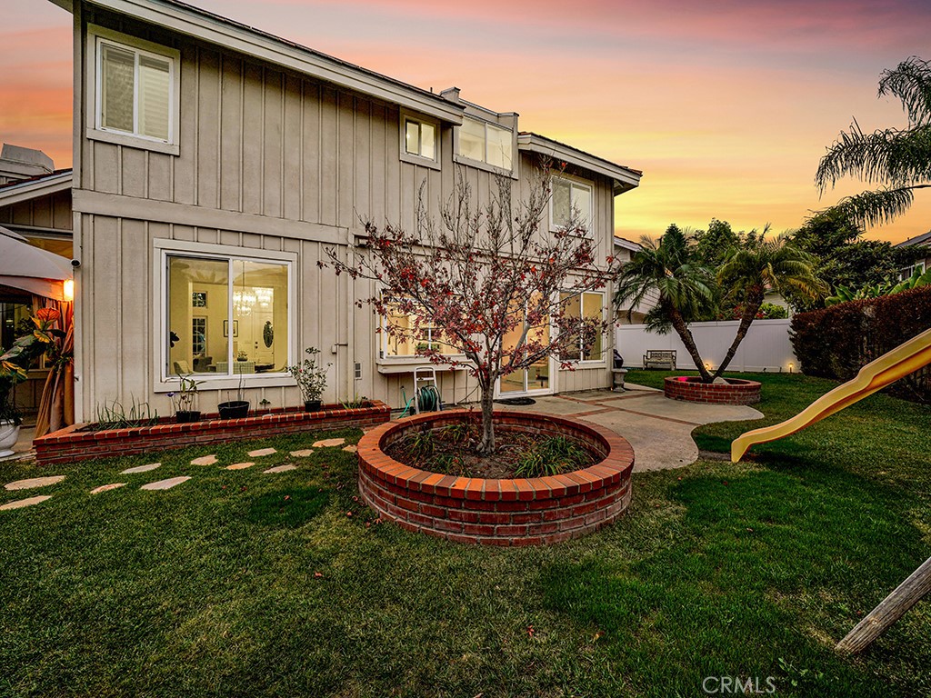 13814 Apache Tustin, CA 92782 - Photo 43 of 45 a view of a backyard with plants and a patio